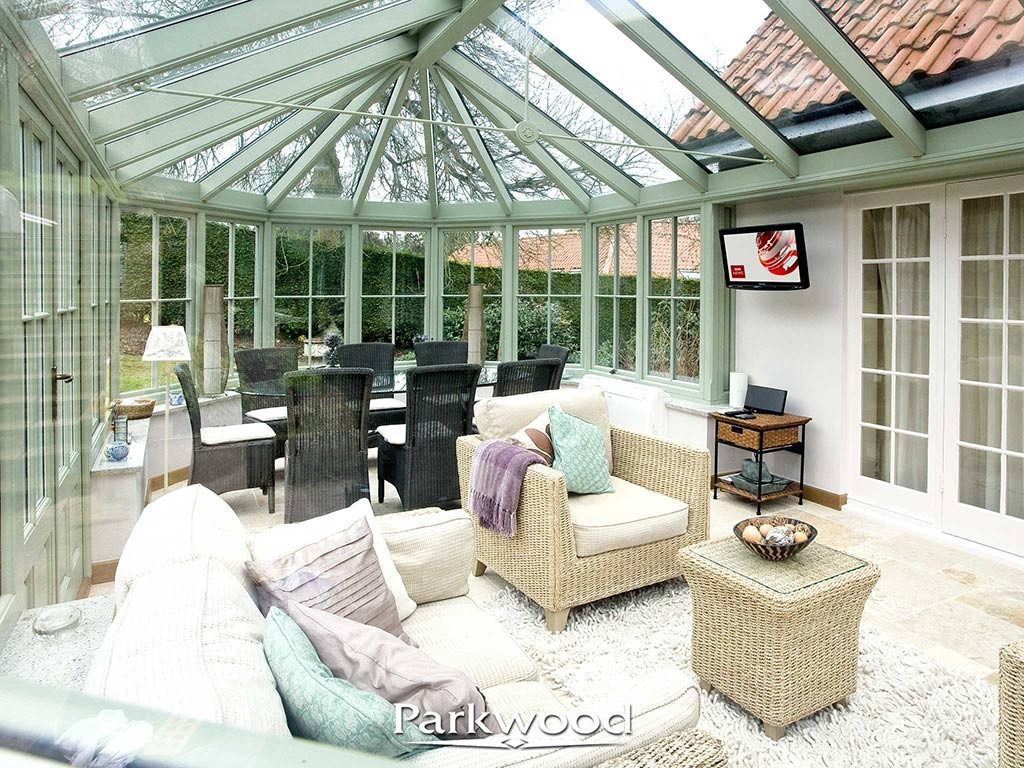 Green Painted timber conservatory by parkwood