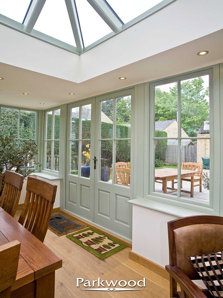 Green painted orangery by Parkwood