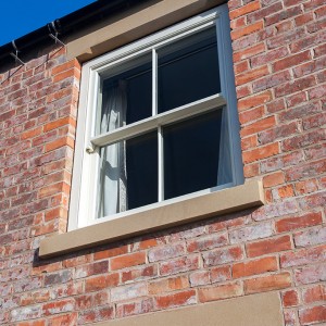Natural Sand Stone Lintol And Cill Compliment This Sliding Sash Window By Parkwood