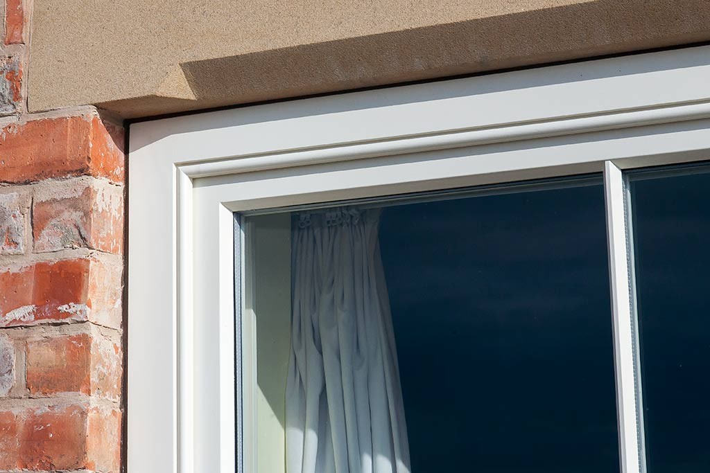 Staff bead and the puttyline window mouldings are complimented by a Stopped chamfered sand stone lintol